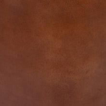 Tan Travie Round Leather Ottoman